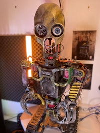 a robot is sitting on top of a desk